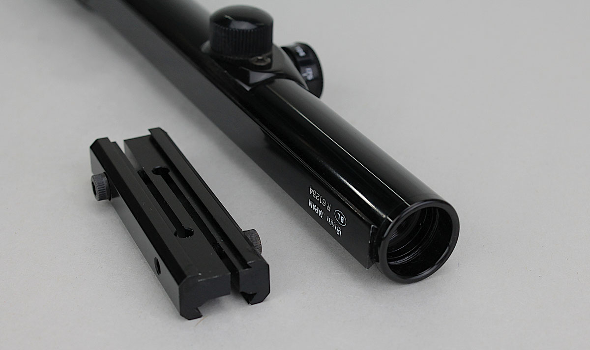 The mount clamps onto the scope’s square underlug and to 3⁄8-inch tip-off receiver grooves.